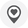 Icon of a location map pin with a heart in the center
